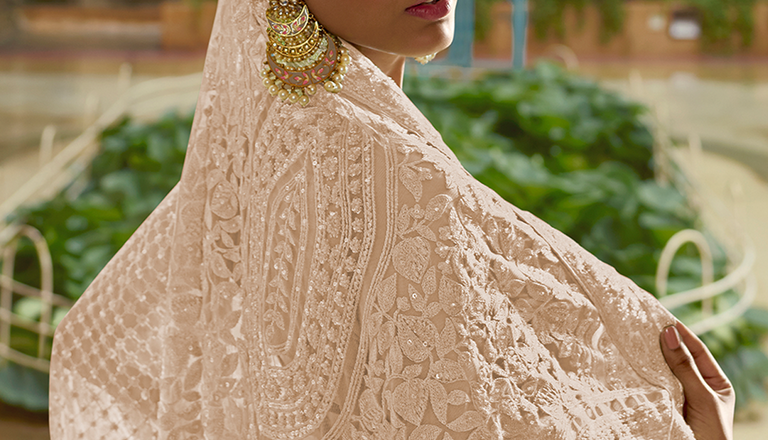 The Enchanting Embrace of Lilac: A Guide to Your Soft Net Saree