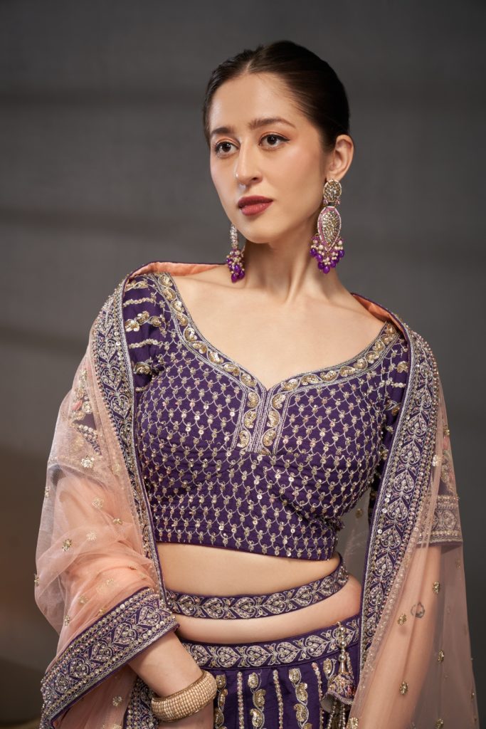 Enchanting Royalty: A Deep Dive into the Purple Pure Silk Bridal Lehenga Choli Set 1 Purple Pure Silk Bridal Lehenga Choli & Dupatta with Moti, Zarkan & Sequin Embellishment