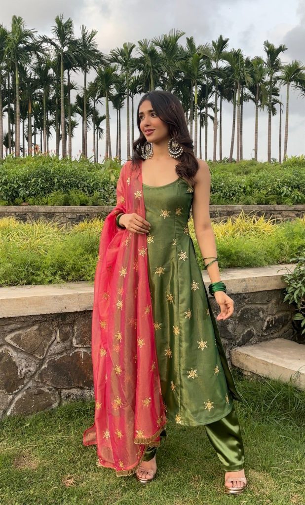 Embrace Elegance: The Olive Green Pant Style Suit with Zari & Sequins Work 1 Embrace Elegance: The Olive Green Pant Style Suit with Zari & Sequins Work
